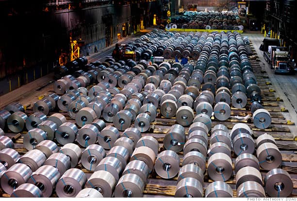 Completed_coils_of_steel_cover_the_floor_in_the_cold_mill_shipping_bay__waiting_to_be_sent_to_customers.CNN_Money